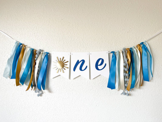 Blue and gold sunshine banner for baby boy’s 1st birthday