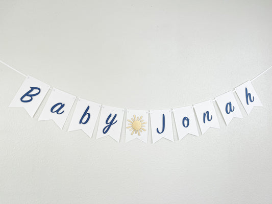 blue and gold sunshine banner for baby boy’s first birthday