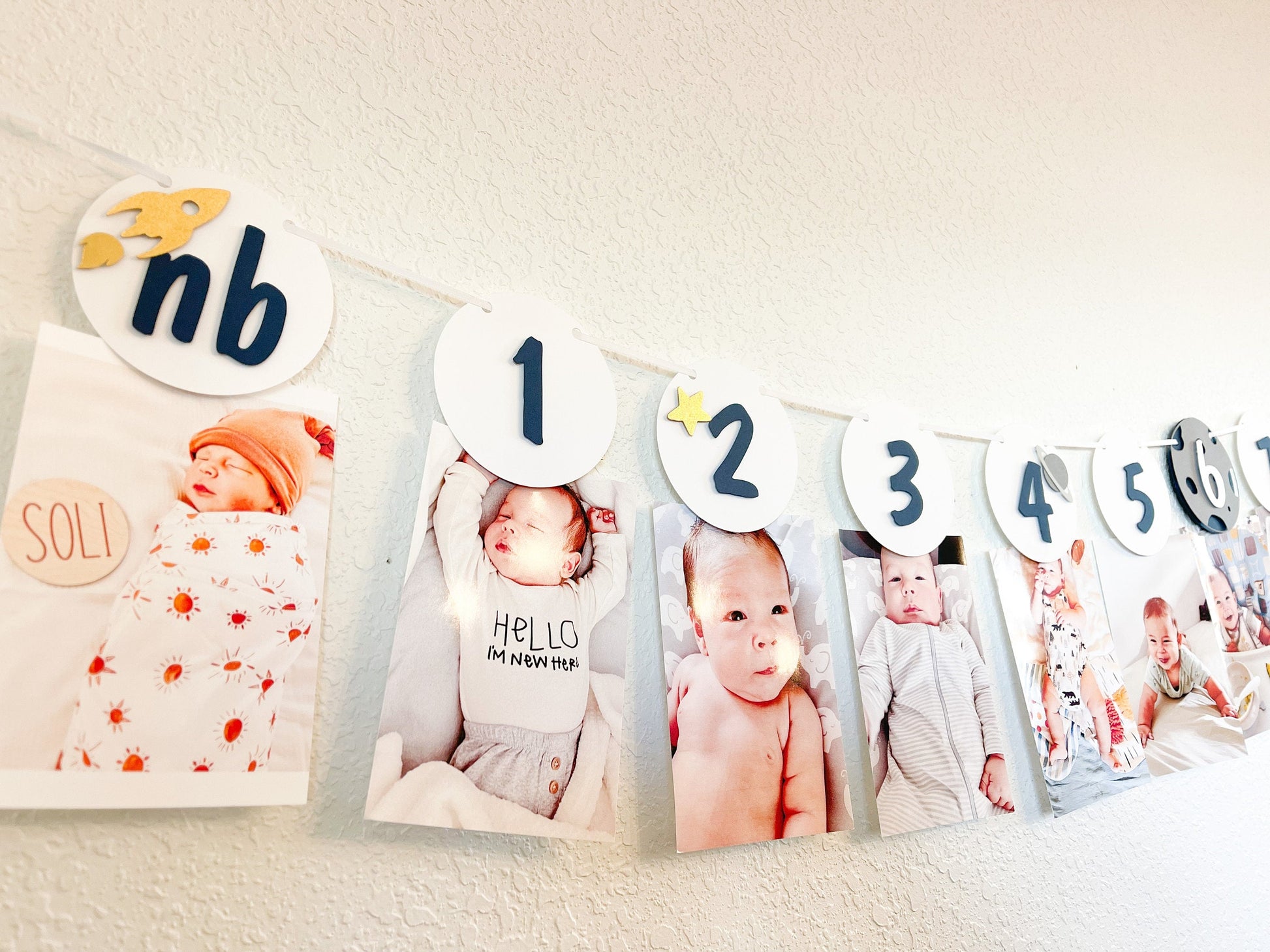 Outer space themed monthly photo banner for first birthday